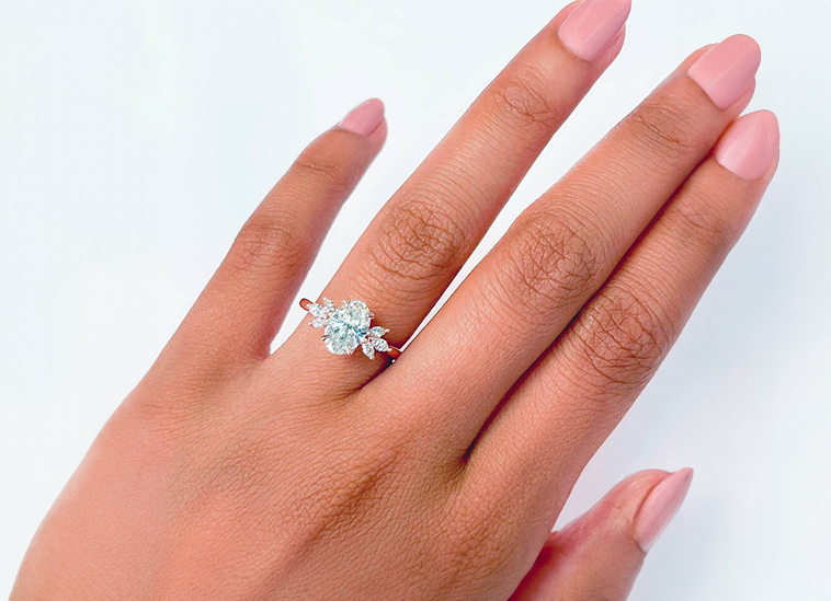Two Flower Oval Engagement Ring | Oval Solitaire Engagement Ring: Buying Guide For Bridal