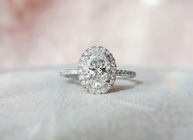 White Diamond Oval Solitaire Engagement Ring
