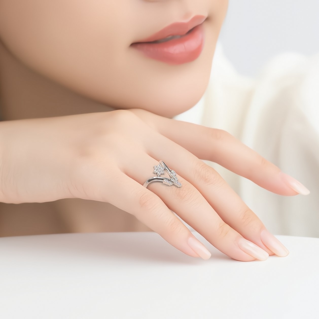 Elegant diamond ring on woman's hand