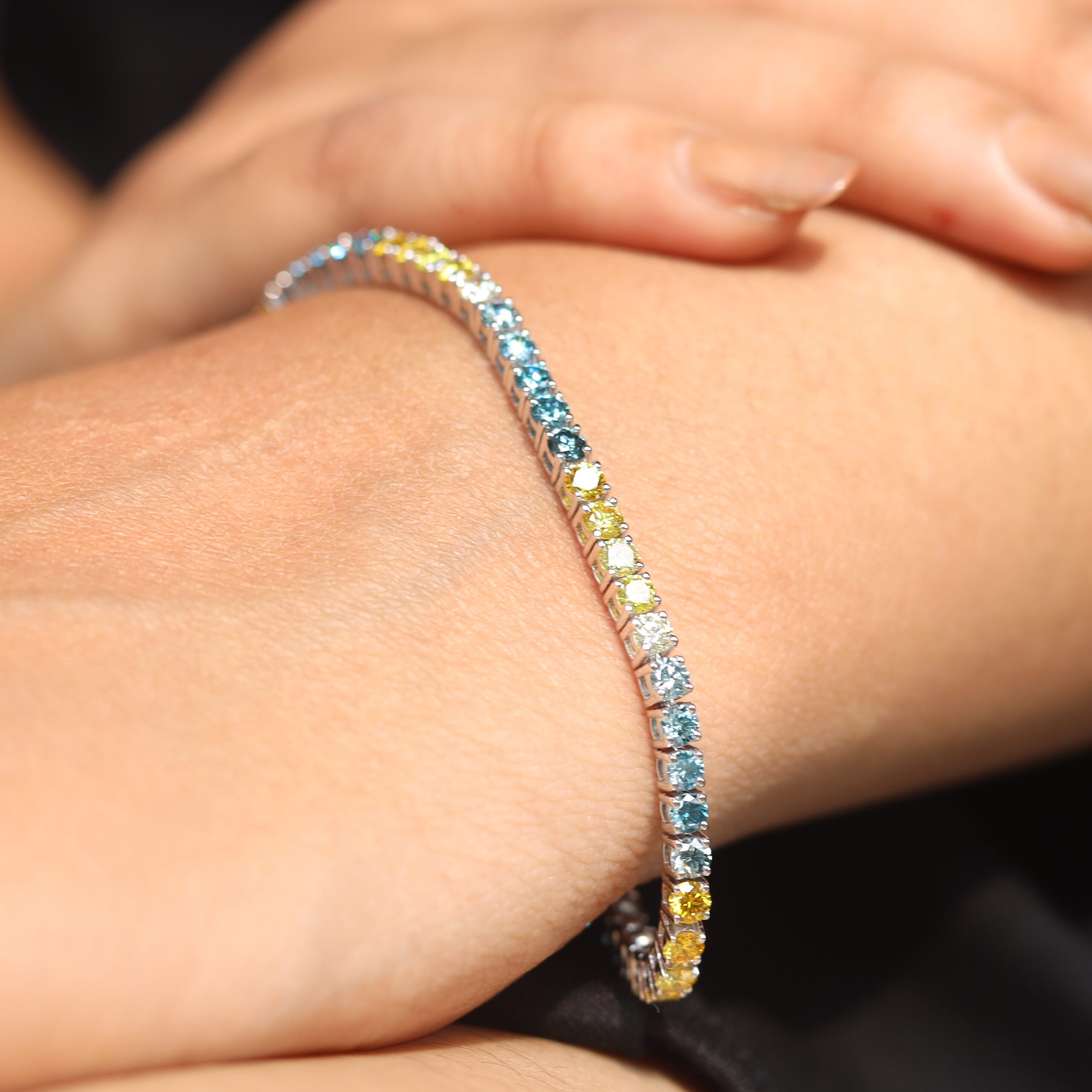 fancy color diamond tennid bracelet