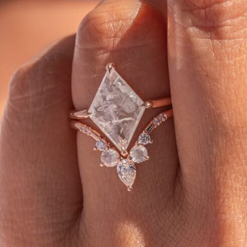 v shaped band with engagement ring